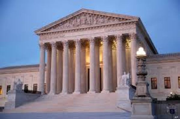 U.S. Supreme Court to hold virtual hearings over COVID-19