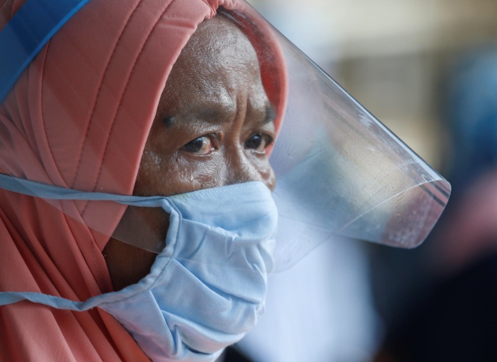 Indonesia reports 1,043 new coronavirus infections, biggest daily rise