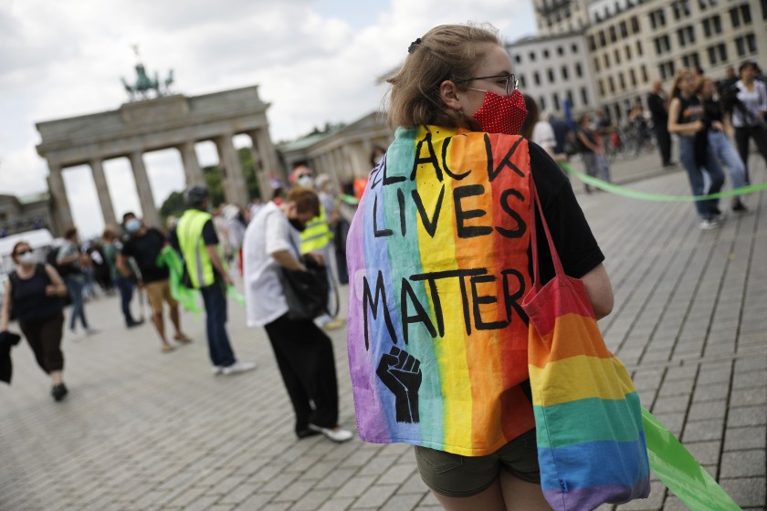 Protestors in German cities form human chains to rally against racism