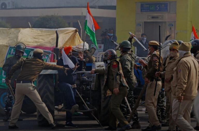 Indian police fire tear gas as protesting farmers enter Delhi’s Red Fort