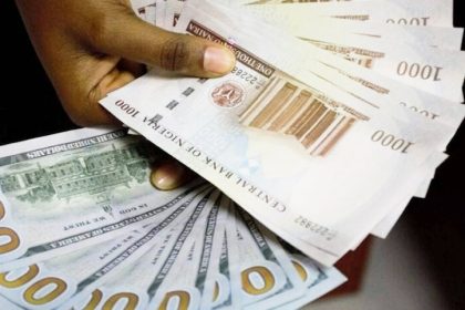 Naira gains N61.38 against dollar at official market